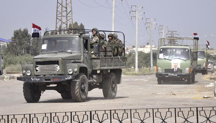 Al-Qaeda affiliate attacks military checkpoint, kills 11 soldiers A Syrian military convoy, file photo