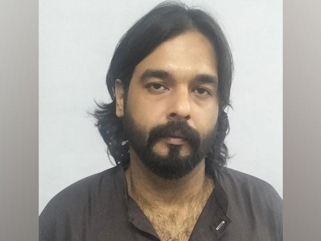 An accused involved in sexually harassing a woman was arrested Photo: Express