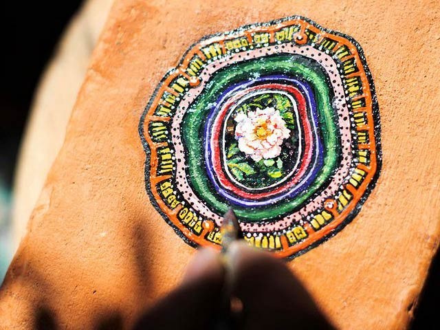 A unique artist who creates pieces of art on dried chewing gum A unique artist who creates pieces of art on dried chewing gum