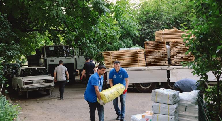 Ali (left) has been working for the humanitarian organization The Tenth of April for more than a year. 