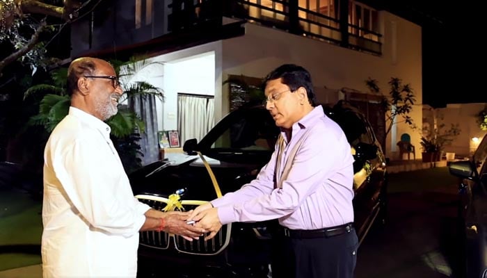 100 crore check and luxury car gift for Rajinikanth 100 crore check and luxury car gift for Rajinikanth