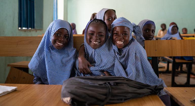 Students at a primary school in eastern Nigeria prepare await the beginning of class.