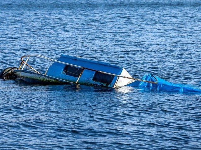 A boat carrying 30 students capsized in a river in India A boat carrying 30 students capsized in a river in India