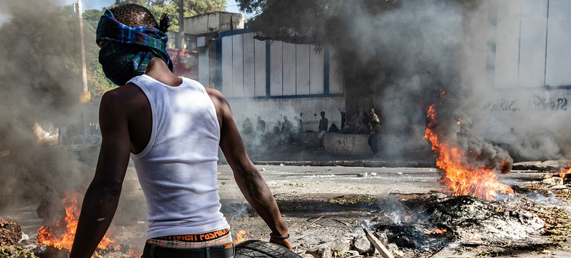 People protest on the streets of  Port-au-Prince in crisis-torn Haiti.