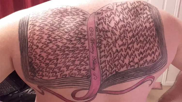 A father has set a world record by making 667 tattoos in his daughter's name