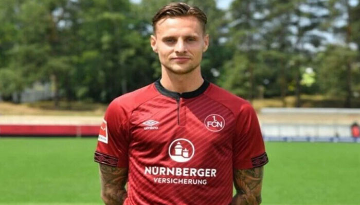 When and how did the German footballer Robert Bauer accept Islam?