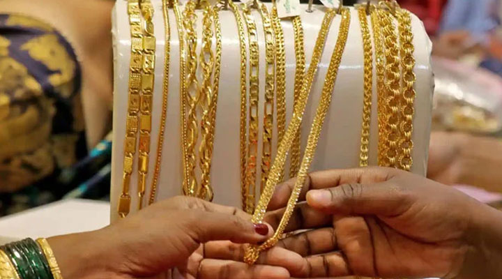 An increase in the price of gold per tola by Rs.6400 -----File photo