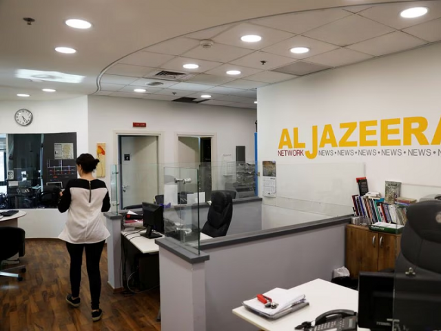 coverage of the attack on Gaza; Israel has stepped up its efforts to shut down the "Al Jazeera" news channel 2 —Photo: Reuters