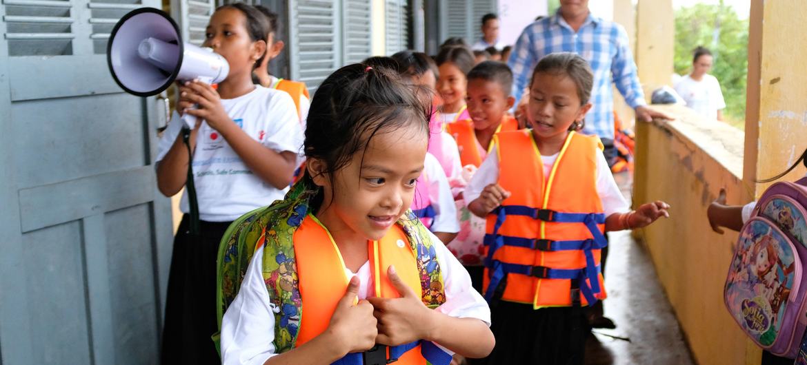 Students take part in a safety evacuation drill in the coastal province of Koh Kong, Cambodia. Students take part in a safety evacuation drill in the coastal province of Koh Kong, Cambodia.