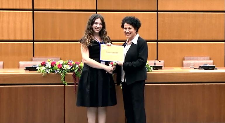 Hanine Jaafar (left) of the St. Joseph University of Beirut receives her award in the Arabic student category. Hanine Jaafar (left) of the St. Joseph University of Beirut receives her award in the Arabic student category.