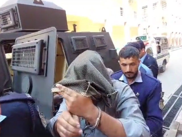 Fawad Chaudhry handed over to police on two-day physical remand Fawad Chaudhry was brought in an armored car and brought to the courtroom with a cloth covering his mouth. Photo: Screen grab