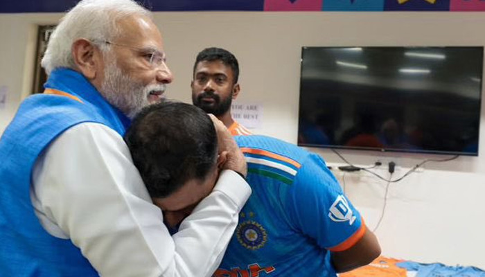 A heartbroken Mohammad Shami shared a picture of him hugging Modi and sharing his grief