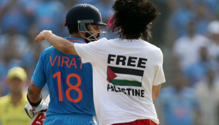 A person wearing a Palestinian flag shirt entered the ground in the World Cup final match