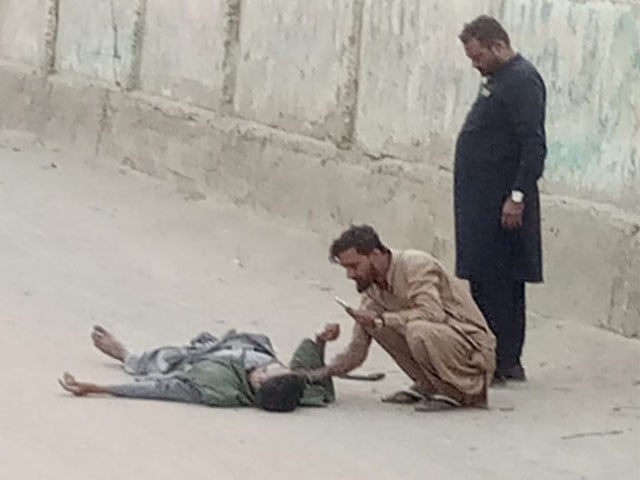 Student injured in suspicious police encounter in Karachi, video surfaced Photo: Video Grab