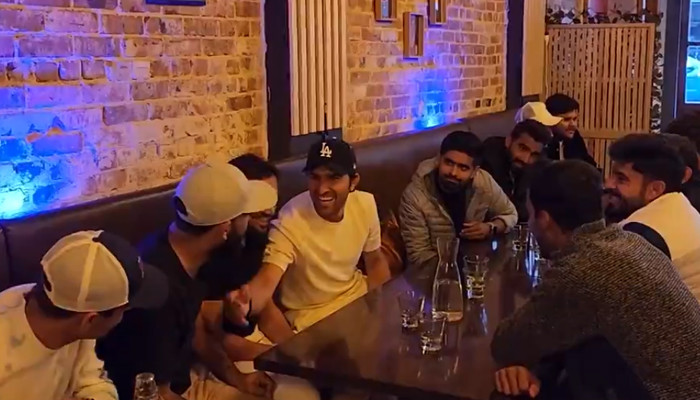 The national squad chats over a meal at a restaurant in Dunedin