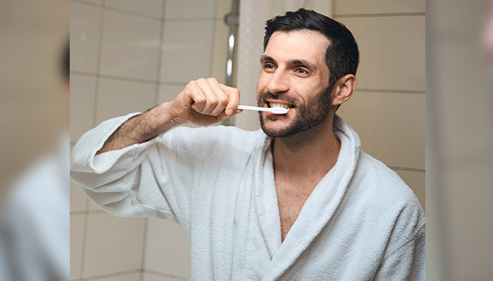What is 'hospital pneumonia'? What does this have to do with daily brushing? ---File photo