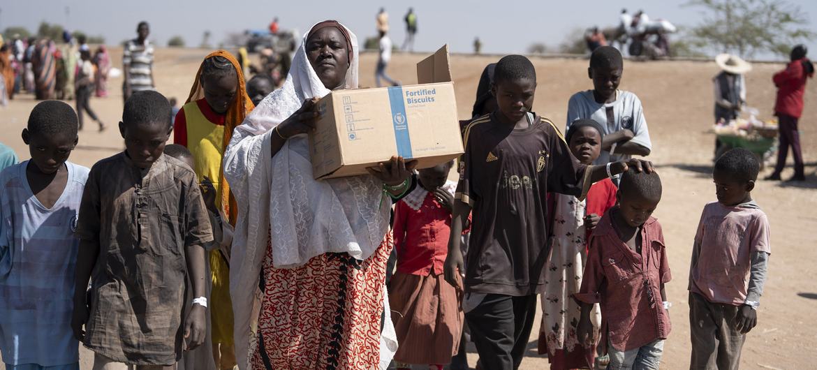 Families arrive in South Sudan after fleeing conflict in Sudan. Families arrive in South Sudan after fleeing conflict in Sudan.
