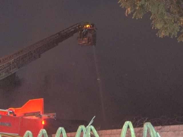 Karachi; Fire in Old Passport Office, all records burnt Photo: The fire brigade is trying to control the fire. Photo: Express News