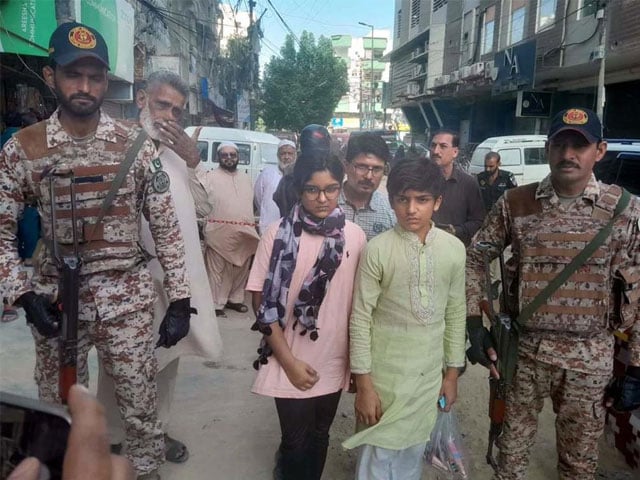 Lady police constable posted at home of young brother, sister in Karachi