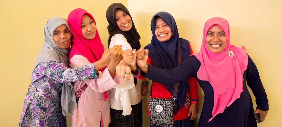 Participants at a discussion on how women contribute to peace in their communities in Indonesia.