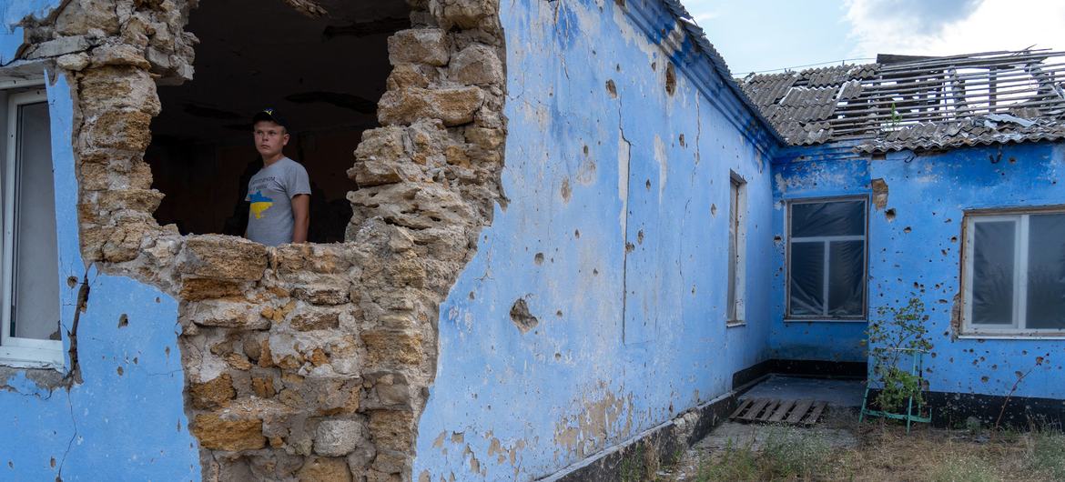A boy stands inside the remains of his school in Novohryhorivka, Ukraine. A boy stands inside the remains of his school in Novohryhorivka, Ukraine.