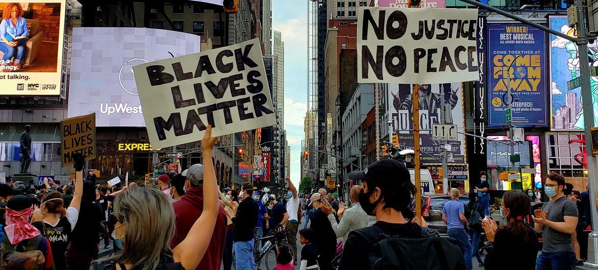 Protesters gather in Times Square in New York City to demand justice and to protest racism in the United States following the death of George Floyd in May 2020, while in police custody. (file). Protesters gather in Times Square in New York City to demand justice and to protest racism in the United States following the death of George Floyd in May 2020, while in police custody. (file).