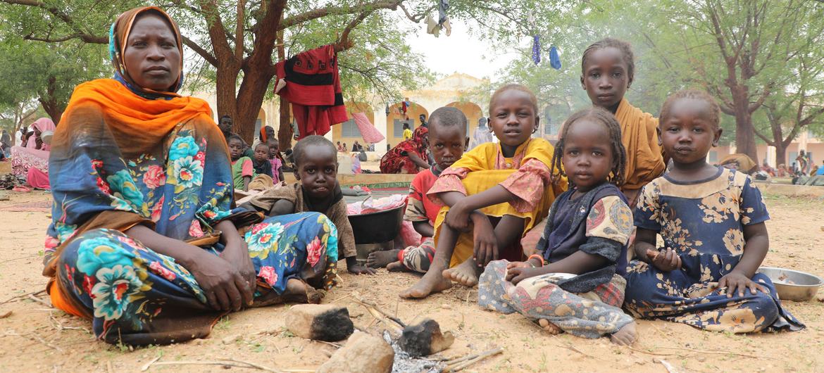 A Sudanese mother and her children take refuge in a town in Chad across the border from Darfur in Sudan.