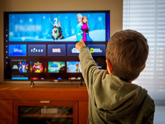 Children's TV viewing can improve their reading skills, research suggests