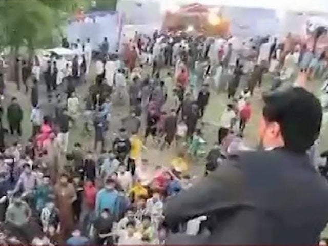 Narowal: Valuable gifts including mobile phones are showered in the procession Photo: Video Grab