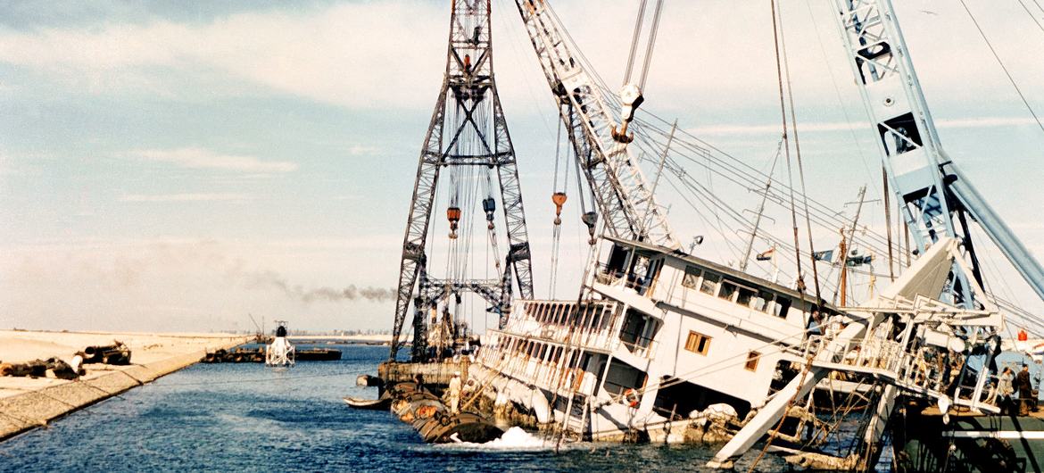 A UN Emergency Force (UNEF) salvage team at work in the Suez Canal raises the sunken Perrier, the world’s largest suction dredger, in 1957. (file)