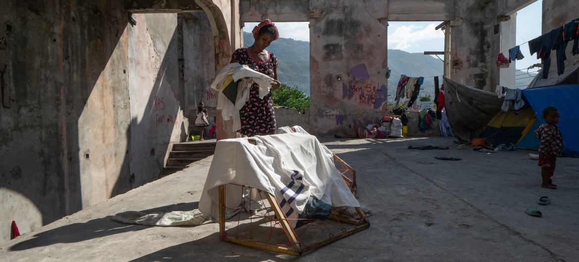 A woman displaced by gang violence is now living in a former theatre in downtown Port-au-Prince.