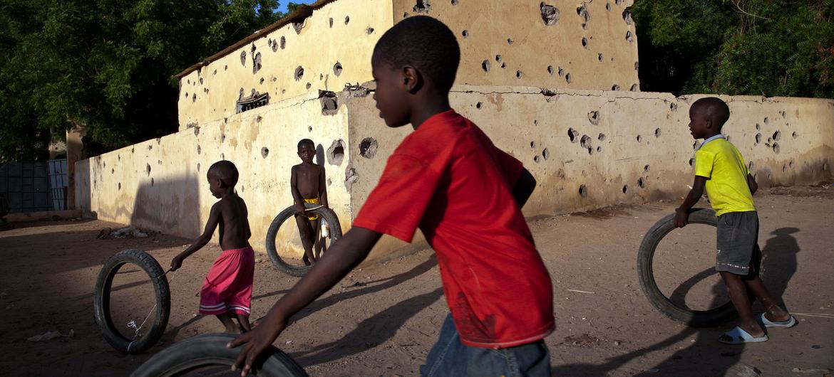 Children play in front of a police station in Gao that was attacked by terrorists.