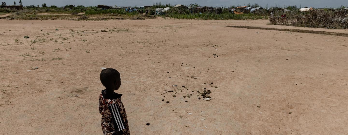 A child stands with water collected from an IDP camp in Nyala, Darfur. (file) A child stands with water collected from an IDP camp in Nyala, Darfur. (file)