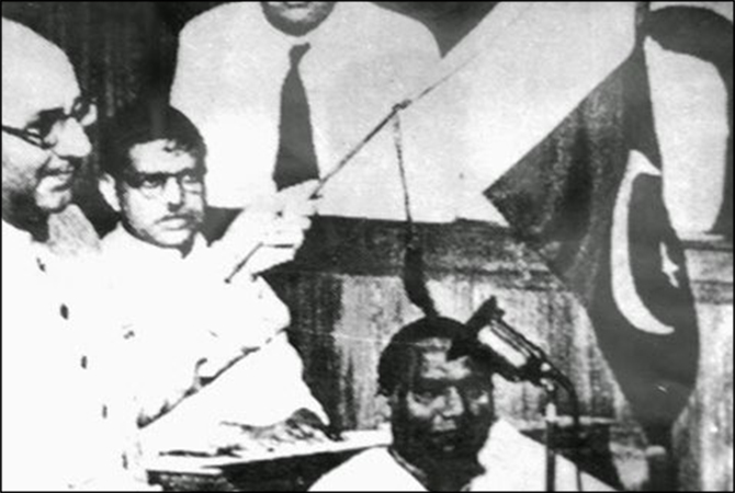 Pakistan’s first Prime Minister Liquat Ali Khan waving the Pakistani flag having crescent and star in the Constituent Assembly in 1947.